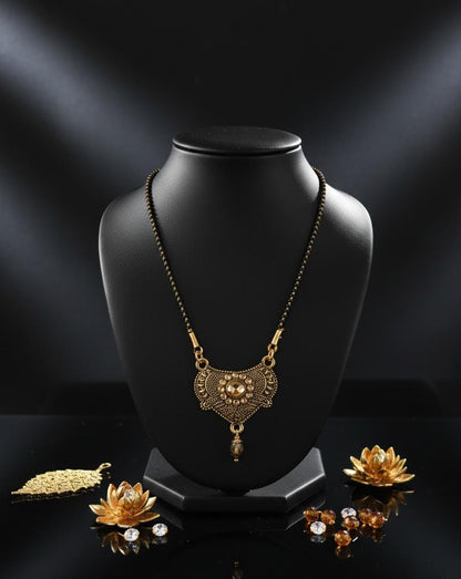 Traditional Gold-Toned Mangalsutra with Intricate Ethnic Pendant