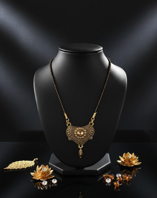 Traditional Gold-Toned Mangalsutra with Intricate Ethnic Pendant
