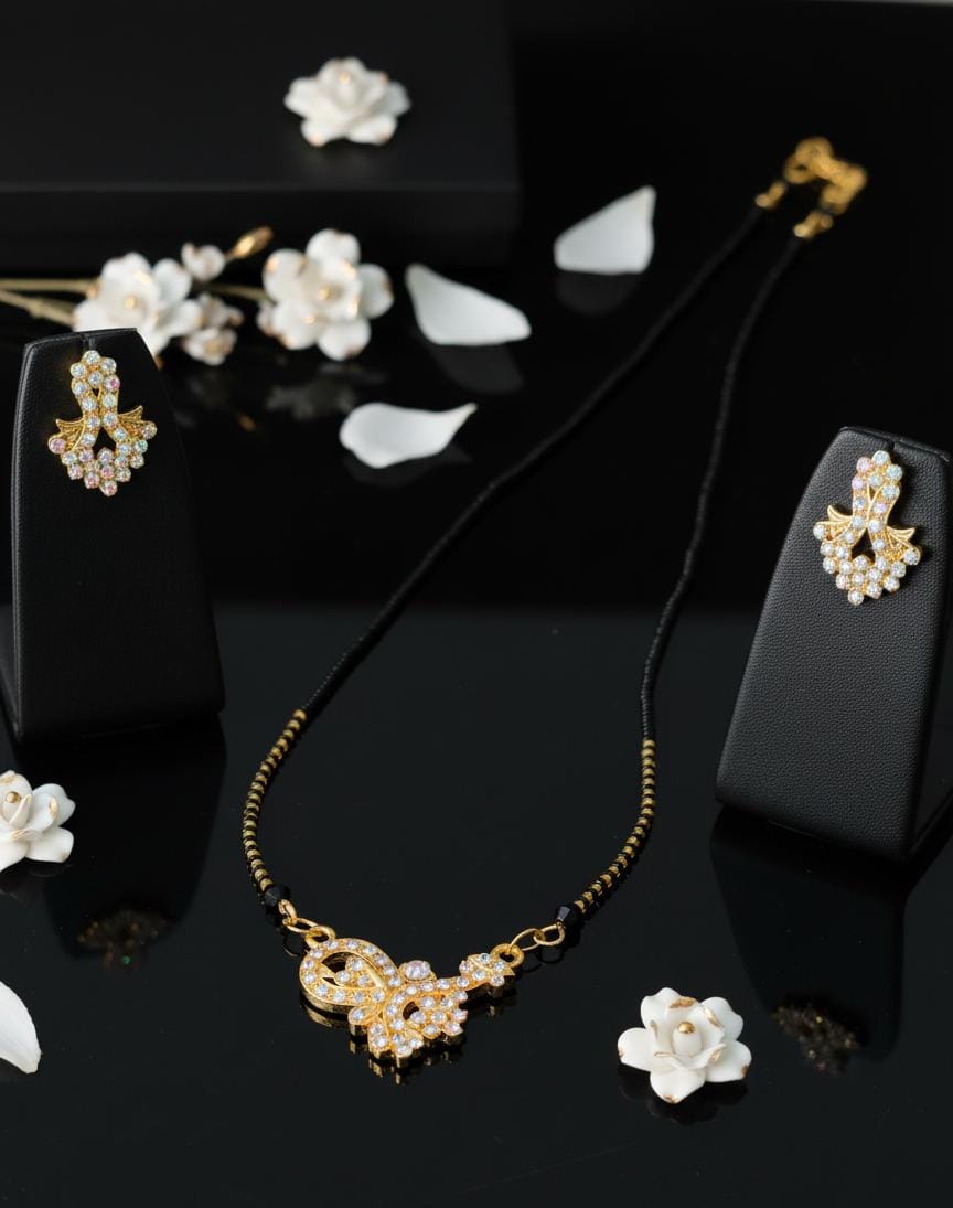 Charming Black Beads & Golden Mangalsutra with a Floral Zircon Pendant
