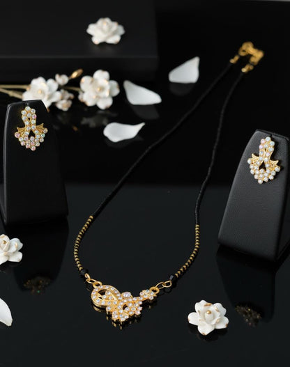 Charming Black Beads & Golden Mangalsutra with a Floral Zircon Pendant